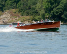 Teal with Gault at the helm. Antique Boat Museum